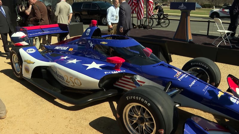 A replica of the vehicles to be used during the Freedom 250 Grand Prix sits on the National...