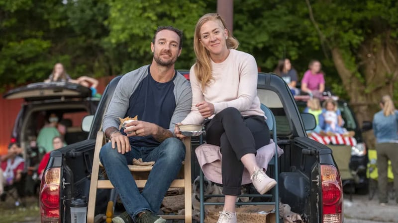 Patrick Heringer and his wife, Sarah, at a drive-in movie event in 2020. Joe Simon For The...