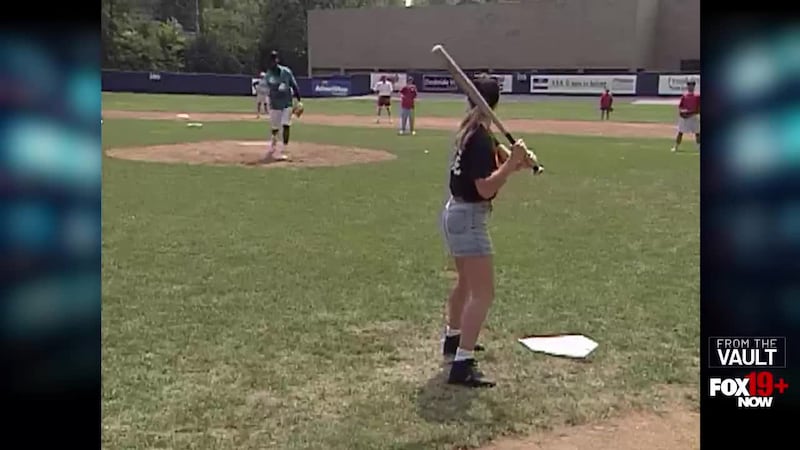 Several members of the Reds organization visit a Special Olympics exhibition baseball game at...